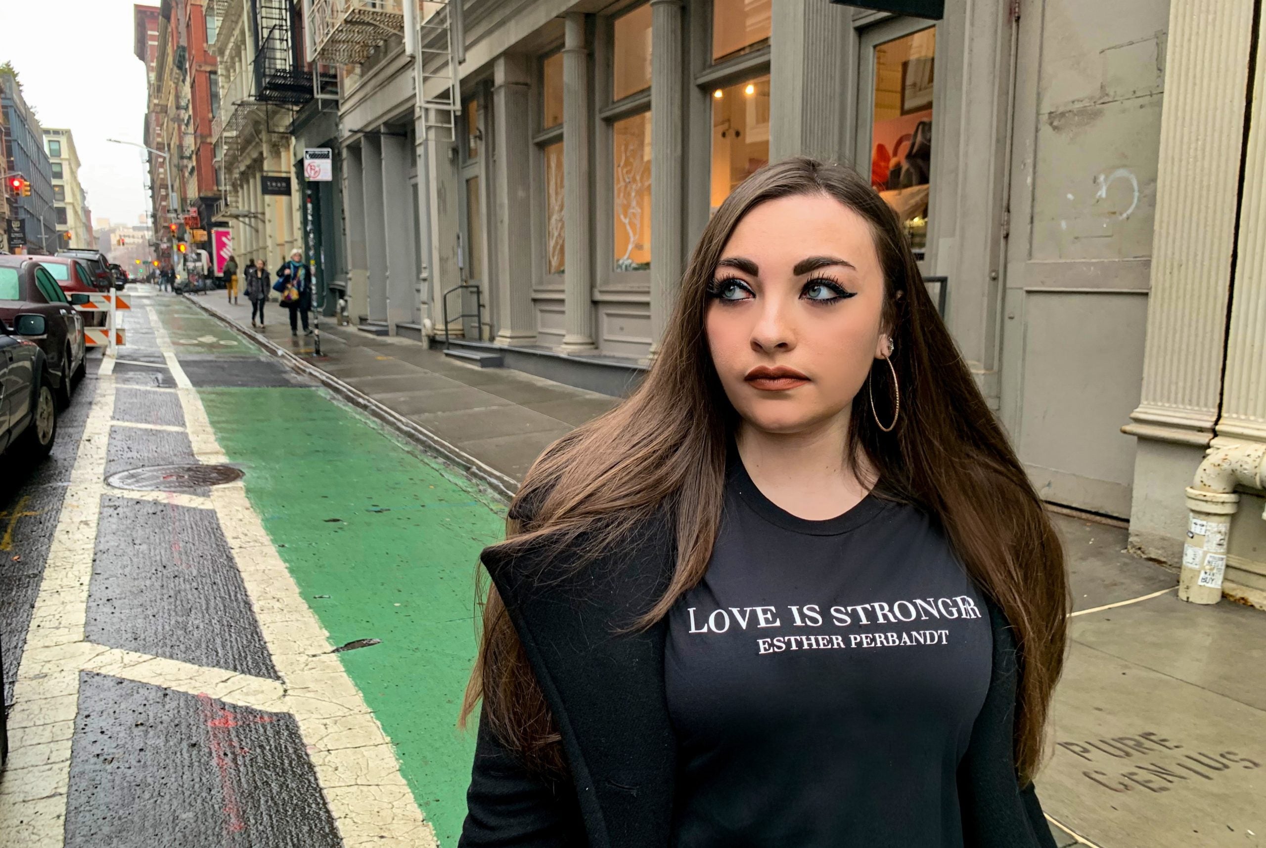 "Love Is Stronger" Women's Black T-shirt - Esther Perbant Collection - Made in Germany - World Chic